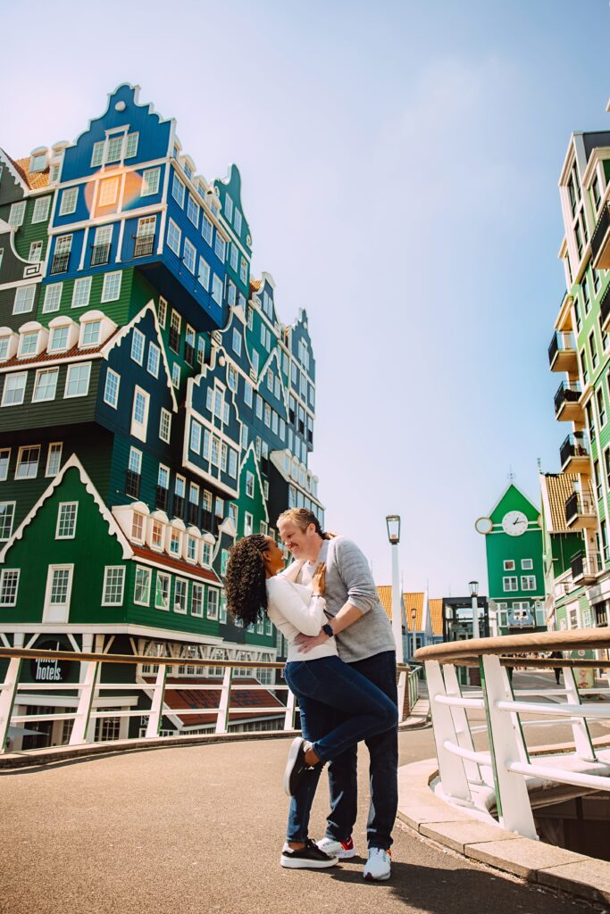 Couple embraces on the streets of Zandaam in Amsterdam