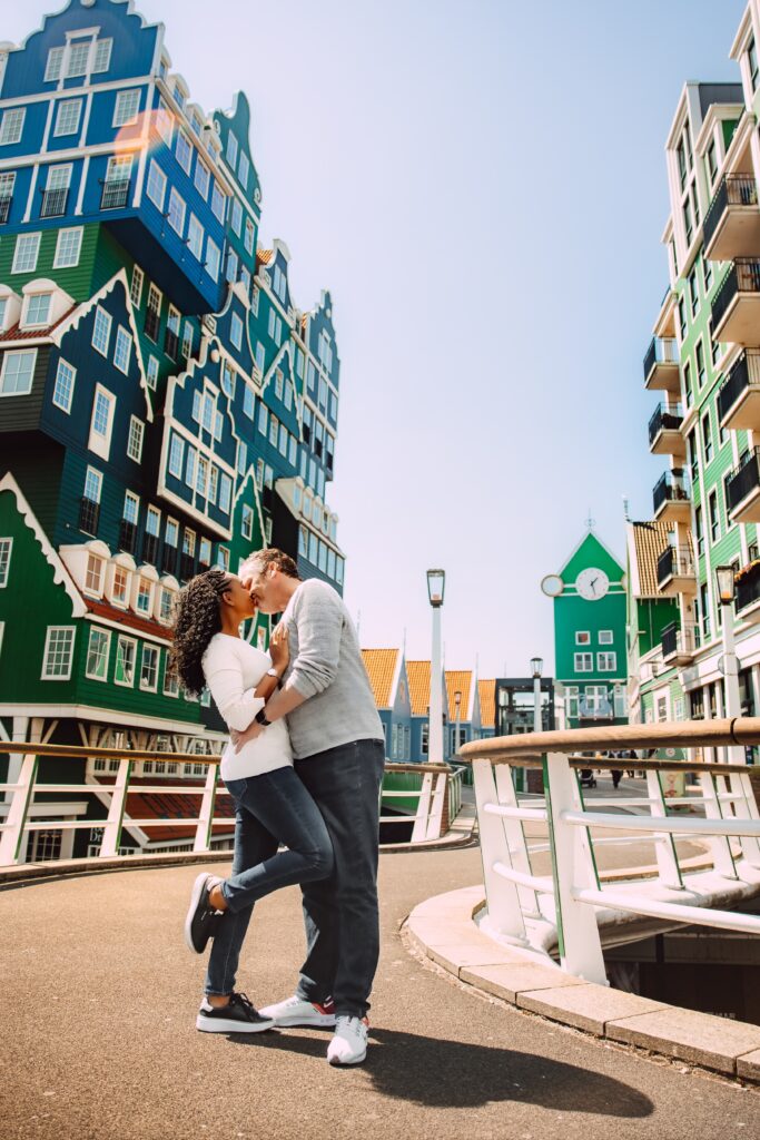 Couple kisses in Zandaam in Amsterdam