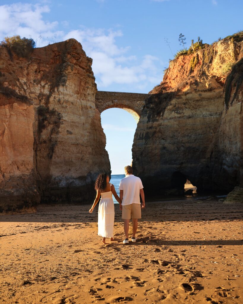 Brett and Zee on the beach at Praia Dos Estudantes