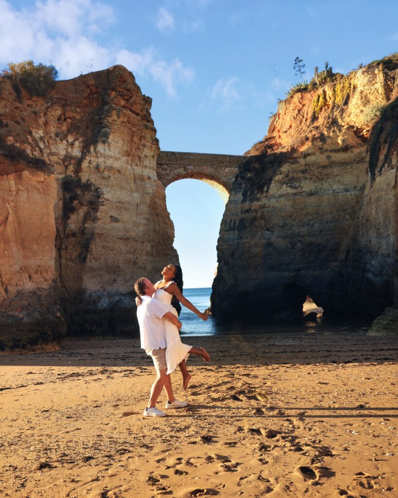 Brett and Zee on the beach at Praia Dos Estudantes