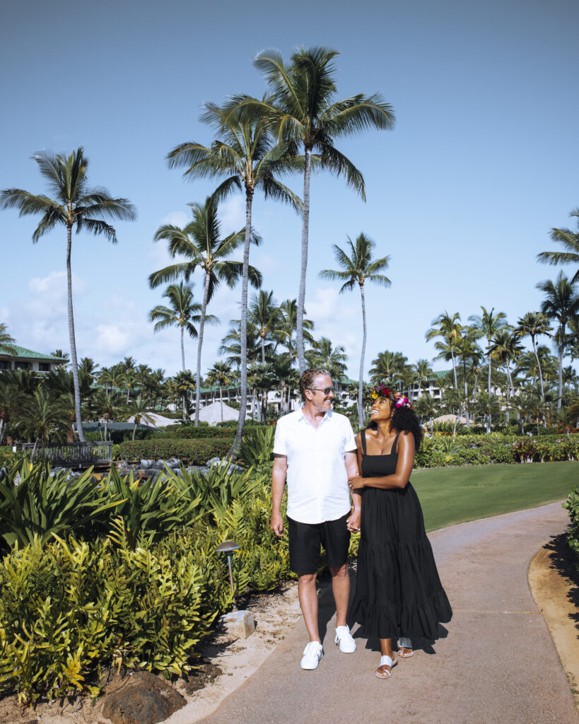 Brett & Zee walking the grounds at the Grand Hyatt Resort & Spa Kauai