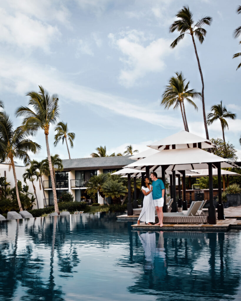 Brett and Zee at Wailea Beach Resort pool doing a collaboration photoshoot